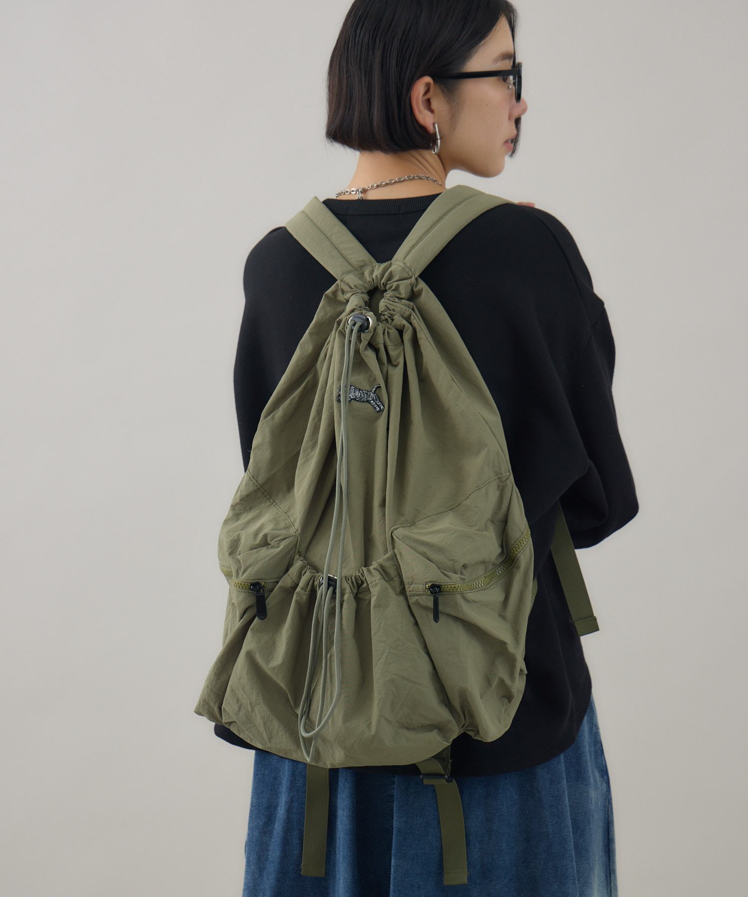 TRANOI. ドローストリングTORAリュック | IKG crossing